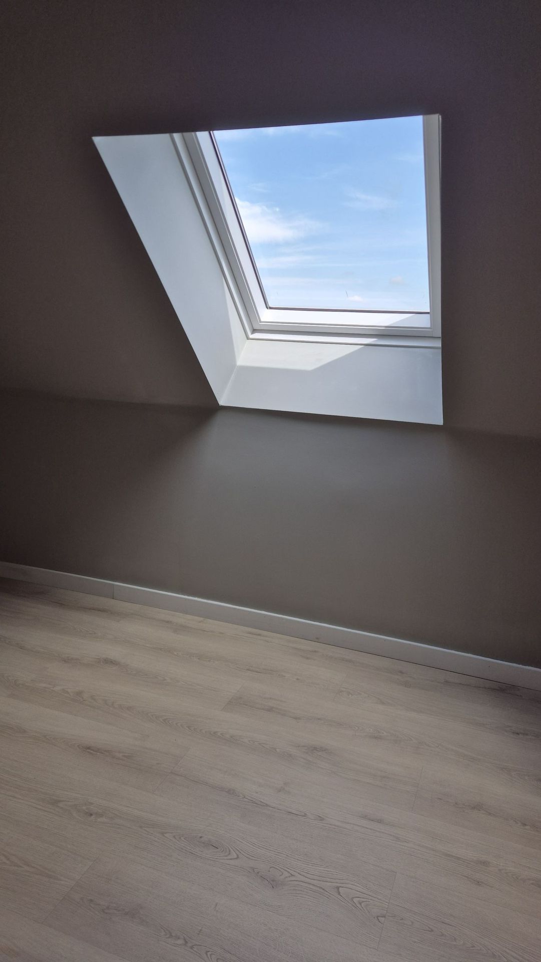 Zolderafwerking met gyproc en isolatie in Grimbergen