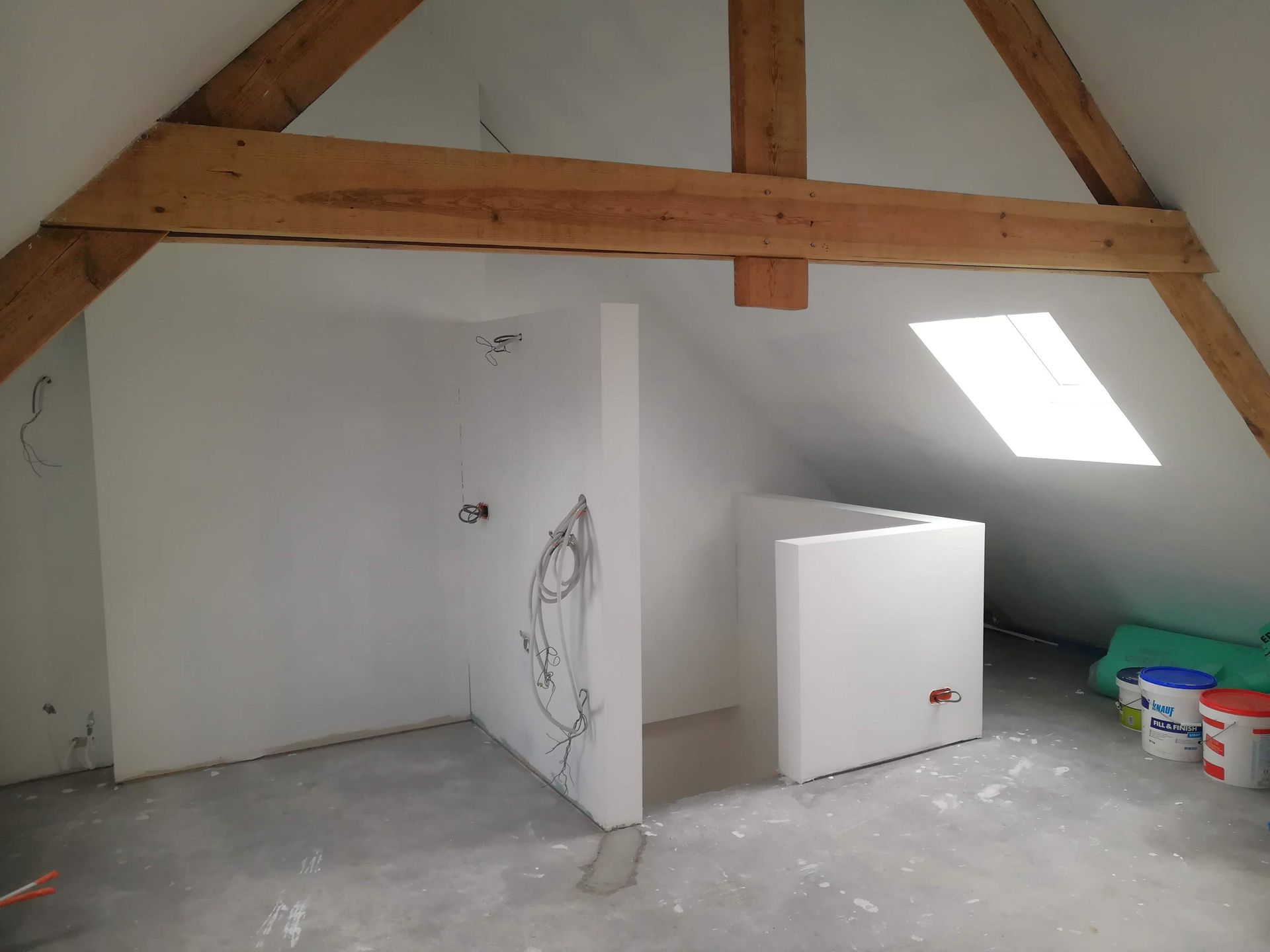 Plaatsing van isolatie en gyproc op zolder in Grimbergen