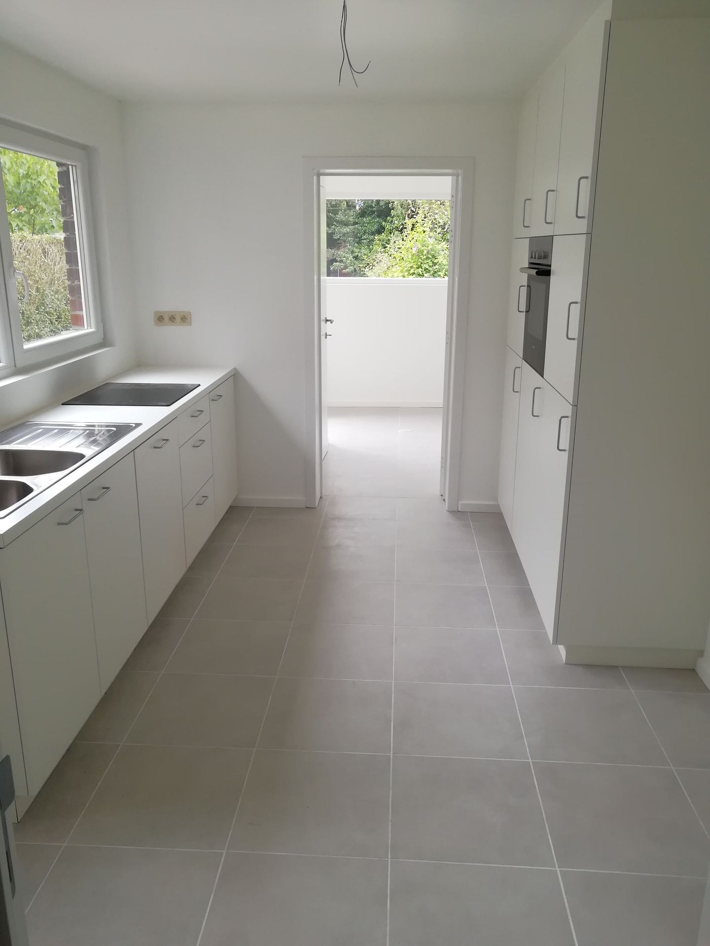 Vloertegels in keuken in Grimbergen